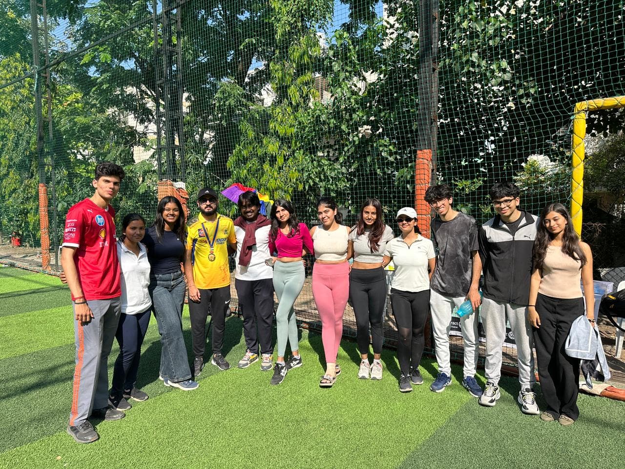 The squad at the outdoor sports meet — medal already around the neck.